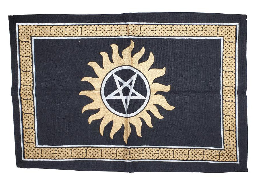 Black cloth with gold border featuring a sun and pentacle symbol